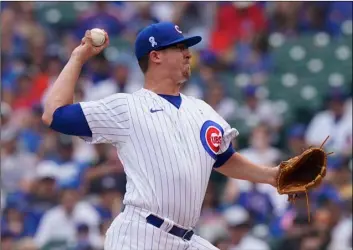  ?? AP Photo/Nam Y. Huh ?? Chicago Cubs starting pitcher Alec Mills throws against the Miami Marlins during the first inning of a baseball game in Chicago, on Sunday.