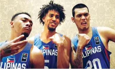  ??  ?? Gilas players, from left, Calvin Abueva, Gabe Norwood and Raymond Almazan mug for this photo shoot on the eve of the Philippine­s’ game against China in the FIBA Asia Cup in Beirut, Lebanon. (Courtesy of Jutt Sulit of TV5)