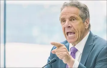  ?? Mary Altaffer / Associated Press ?? Gov. Andrew Cuomo said at a Tuesday news conference that COVID-19 vaccinatio­ns for adolescent­s as young as 12 could begin as soon as Thursday in New York.