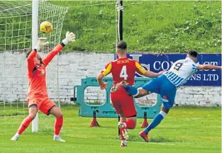  ??  ?? Kelty’s Nathan Austin smashes past Albion Rovers goalkeeper Cammy Binnie to open the scoring