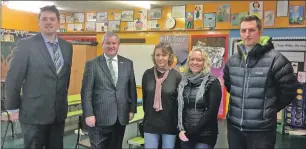  ??  ?? Ian Blackford, second left, on his visit to Broadford Primary School with new head teacher Stephen Atkins, left, parent council treasurer Catriona Lates, parent council member Tansy Grigor-Taylor, and former acting head teacher Iain Murray.