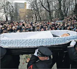  ??  ?? The memorial service of Boris Nemtsov, above, reminded Browder, top, of the murder of his friend and lawyer, Sergei Magnitsky, right. Khordokovs­ky, above right, was jailed on the orders of President Putin