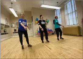  ?? FRANK MECHAM — THE NEWS-HERALD. ?? Magaly Azuara, Sarah Savelli and Sophie Savelli give a preview to their next performanc­e after a ribbon cutting for The Cleveland Tap Dance Conservato­ry in Euclid.