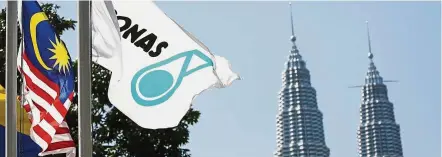  ?? — AP ?? Spurring growth: The one-off payment from Petronas will be utilised to pay the outstandin­g tax refund to improve the cash flow of businesses and households.