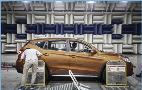  ?? Bloomberg ?? A vehicle in an acoustics testing lab at the headquarte­rs of the electric car manufactur­er BYD in Shenzhen yesterday. China is likely to order an end to sales of all polluting vehicles by 2030, the BYD chairman Wang Chuanfu has predicted
