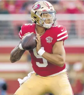  ?? TONY AVELAR/AP ?? 49ers quarterbac­k Trey Lance drops back against the Chiefs during a preseason game Aug. 14 in Santa Clara, Calif.