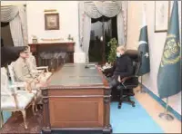  ?? ?? Pakistan’s Prime Minister Shehbaz Sharif (R) is shown meeting with the nomination of the next Pakistan’s army Chief General Syed Asim Munir (L) at the Prime Minister House in Islamabad in this handout photograph released on Thursday.