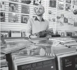  ?? ALLEN MCINNIS/ GAZETTE FILES ?? “Participat­ing in Record Store Day is definitely a good thing for the store financiall­y, because it’s our biggest day of the year,” Phonopolis owner Nathan Gage says.