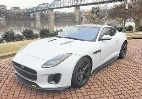  ?? STAFF PHOTOS BY MARK KENNEDY ?? The 2018 Jaguar F Type coupe has been heralded as one of the most beautiful cars in the world.