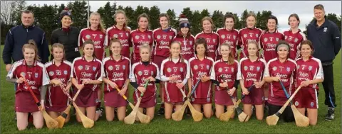  ??  ?? The triumphant St. Martin’s squad with mentors James Bridges, Ellen O’Connor and Seán Whelan.