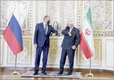  ?? Iranian Foreign Ministry / AP ?? Iranian Foreign Minister Mohammad Javad Zarif, right, and Russian Foreign Minister Sergey Lavrov meet in Tehran on Tuesday.