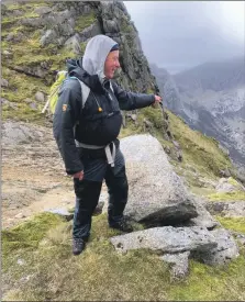  ?? 01_B21mountai­n10 ?? Goatfell Murder walk leader Alastair Howe points down Coire nam Fuaran, the ill-fated route taken by Laurie and Rose.