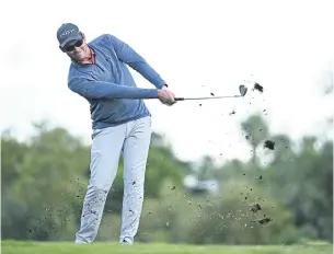  ?? AFP ?? Adam Schenk hits an approach shot in the Shriners Children’s Open at TPC Summerlin in Las Vegas.