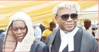  ?? ?? Justice Lawal-Akapo (left) and Chief Bolaji Ayorinde, SAN