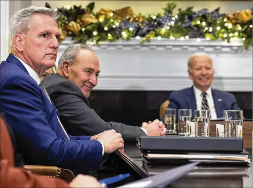  ?? ANDREW HARNIK/AP 2022 ?? Then-u.s. House Minority Leader Kevin Mccarthy (left) is shown with Senate Majority Leader Chuck Schumer (center) and President Joe Biden in November. Now as speaker, Mccarthy’s interactio­ns with Biden over the next several months will have a significan­t impact on the economy and, by extension, their political futures.