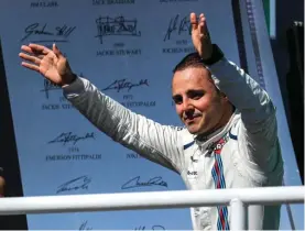  ??  ?? Felipe Massa (Williams) celebrates his last Brazilian race on the podium at the Brazilian Grand Prix.
