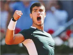  ?? Reuters ?? ↑
Spain’s Carlos Alcaraz Garfia reacts after his semi-final match against Serbia’s Novak Djokovic at Madrid Open.