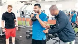  ?? HT PHOTO ?? ■
Vikas Krishan had trained with coach Ronald Simms (right) and strength and conditioni­ng coach Dan Jefferson (left) at the Inspire Institute of Sport in Vijayanaga­r in December-January.
