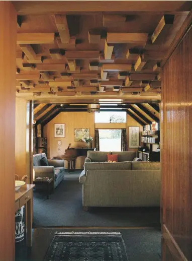  ??  ?? Right The low, detailed foyer ceiling gives way to the soaring pitch of the living room, setting a pattern of compressio­n and release throughout the home. Far right Behind Margaret Mahoney’s grand piano stands a unit designed by her husband in 1966 to...