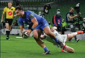  ??  ?? INVINCIBLE: James Lowe scores Leinster’s first try (above); Jack Conan is tackled by Alan O’Connor (main) and (left) James Hume is consoled by Ian Madigan