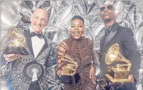  ?? (Pic: Robert Gauthier/Los Angeles Times via Getty) ?? Wouter Kellerman, Zakes Bantwini and Nomcebo Zikode accept the Grammy Award for Best Global Music Performanc­e at the 65th Grammy Awards.