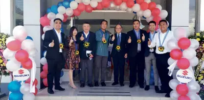  ??  ?? San Nicolas, Ilocos Norte Vice Mayor Marlon Valdez (fourth from left), Grand Canyon Multiholdi­ngs, Inc. chairman Peter Po, GCMI comptrolle­r Caroline Po and Suzuki PH director and general manager automobile division Keiichi Suzuki lead the Suzuki Auto Ilocos Norte inaugurati­on.