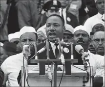  ?? THE ASSOCIATED PRESS ?? Martin Luther King Jr., head of the Southern Christian Leadership Conference, addresses marchers during his “I Have a Dream” speech at the Lincoln Memorial in Washington, D.C., on Aug. 28, 1963.