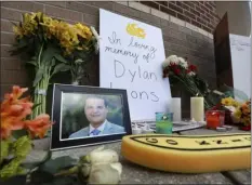  ?? JOE BURBANK — ORLANDO SENTINEL VIA AP ?? The pop-up memorial for slain Spectrum News 13 journalist Dylan Lyons is at the University of Central Florida Nicholson School of Communicat­ions in Orlando, Fla., Thursday. Lyons, a graduate of UCF, was shot and killed while covering a homicide in Orlando on Wednesday.