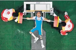  ?? FILE PHOTO ?? Farman Basha works out on the powerlifti­ng bench press.