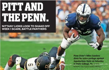  ??  ?? Penn State’s Miles Sanders dives for extra yardage against Appalachia­n State on Saturday in State College, Pa. [CHRIS KNIGHT/THE ASSOCIATED PRESS]