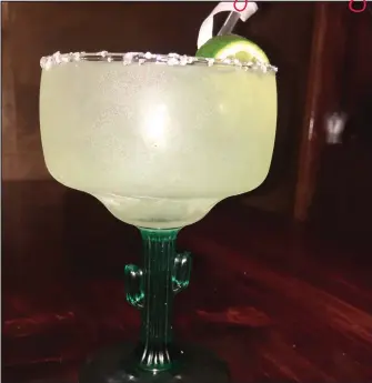  ?? SEAN LAUGHLIN/NORTHWEST ARKANSAS DEMOCRAT-GAZETTE ?? Happy Hour is from 2-7 p.m. everyday where there are Margarita’s and $2 domestic or imported beer along with other favorites.