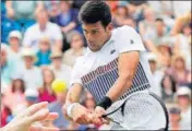  ?? REUTERS ?? With Andre Agassi as coach, Novak Djokovic would hope to overcome form slump.