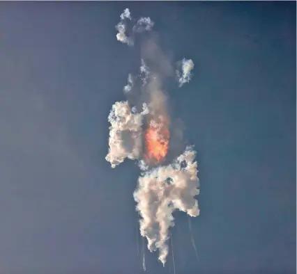  ?? Photo: Reuters ?? SpaceX’s next-generation Starship spacecraft, atop its powerful Super Heavy rocket, explodes after its launch from the company’s Boca Chica launchpad.