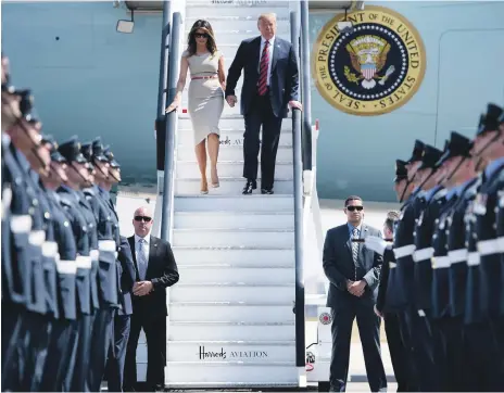  ?? AFP ?? US President Donald Trump and his wife Melania disembark Air Force One at Stansted Airport on Thursday at the beginning of a four-day trip that will include tea with Queen Elizabeth II and a meeting with Prime Minister Theresa May