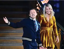  ??  ?? Ada Hegerberg seems to see the funny side as she is interviewe­d by Martin Solveig after being presented with the women’s Ballon d’Or