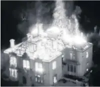  ??  ?? Drone footage taken by Lancashire Fire & Rescue Service shows the blaze at its height