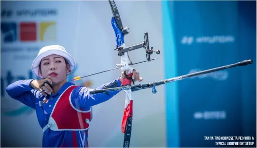  ??  ?? Tan Ya-ting (chinese Taipei) with a typical lightweigh­t setup