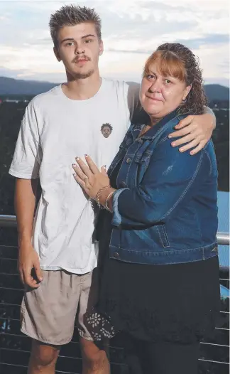  ??  ?? McKenzie Weir, 19, with his mother Jodee, was hit by a taxi in Bali. Picture: RICHARD GOSLING