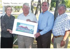  ?? The Sentinel-Record/File photo ?? ■ Melvin Daniel, right, is shown with, from left, the late City Director Cynthia Keheley, the late state Sen. Terry Smith, and former City Manager Kent Myers, with an artist’s rendering of the then-proposed Hot Springs Farmers Market pavilion in August 2005.