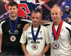  ??  ?? Ivan Carroll, Michael Dowling and Myles Carroll at the World Handball Championsh­ips in Minnesota, USA.