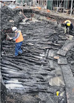  ?? PHOTO: STEPHEN JAQUIERY ?? Mudedin uncovered . . . In this 2008 file photo, then University of Otago anthropolo­gy student Maria Butcher sketches the early Dunedin causeway discovered at the Dunedin City Council's Wall Street developmen­t.