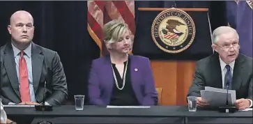  ?? Chip Somodevill­a Getty Images ?? MATTHEW WHITAKER, left, President Trump’s selection to be acting attorney general, takes part in a Justice Department event in August with Kristi Johnson of the FBI and then-Atty. Gen. Jeff Sessions.