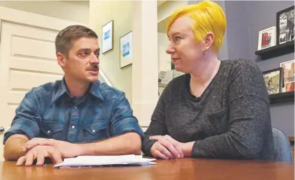  ?? Gillian Flaccus, The Associated Press ?? Andy Kraft and his wife, Amy Elias, discuss their 2018 tax paperwork at their home in Portland, Ore. The couple received a small refund last year but this year owe the IRS more than $10,000 in taxes. “My jaw hit the floor,” Kraft said. The couple asked a CPA to verify the figures they were seeing on TurboTax. Crushingly, they were correct.