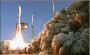  ?? JOHN RAOUX / AP ?? A United Launch Alliance Atlas V rocket lifts off Thursday from Pad 41 at the Cape Canaveral Air Force Station in Florida, sending a rover to Mars to search for signs of life and explore the Red Planet’s geology.