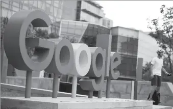  ?? -AP ?? The brand logo of Alphabet Inc's Google is seen outside its office in China.