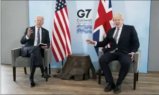  ?? PATRICK SEMANSKY — THE ASSOCIATED PRESS ?? President Joe Biden and British Prime Minister Boris Johnson visit during a bilateral meeting ahead of the G-7summit Thursday in Carbis Bay, England. The president and prime minister are looking for areas of agreement amid some tensions between their nations.