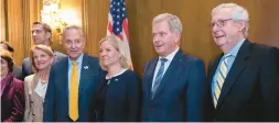  ?? J. SCOTT APPLEWHITE/AP ?? Senate Majority Leader Chuck Schumer, from left, Swedish Prime Minister Magdalena Andersson, Finnish President Sauli Niinisto and Senate Minority Leader Mitch Mcconnell arrive for a meeting Thursday at the U.S. Capitol. Finland and Sweden are moving quickly to try to join NATO in response to Russia’s invasion of Ukraine.