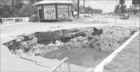  ??  ?? The sinkhole on Seawall Road.