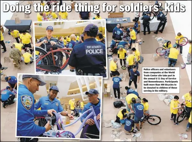  ??  ?? Police officers and volunteers from companies at the World Trade Center site take part in the annual 9/11 Day of Service and Remembranc­e. Participan­ts built more than 400 bicycles to be donated to children of those serving in the military.