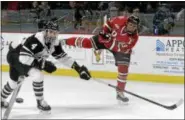  ?? BY DAVID JOHNSON — DJOHNSON@DIGITALFIR­STMEDIA.COM ?? RPI’S Lou Nanne (23) takes a shot as Union’s Nick DeSimone defends in the Mayor’s Cup NCAA ice hockey game Thursday, Jan. 19, 2017at the Times Union Center in Albany. Nanne will graduate early and leave the RPI hockey program with a year of eligibilit­y...